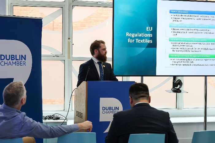 A person standing at a podium

AI-generated content may be incorrect.